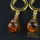 Amber earrings with gold metal beads